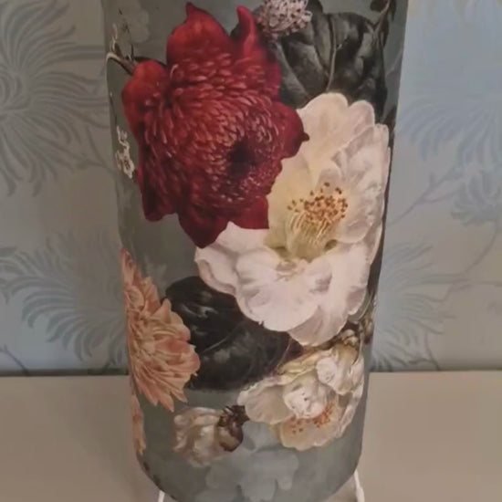Video showing close up of a botanical velvet cyclinder table lampshade.